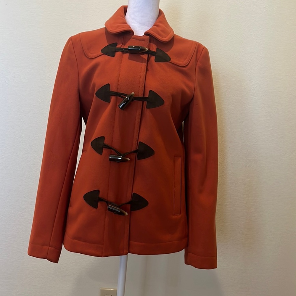 Gap Women’s size small burnt orange coat with toggle buttons.